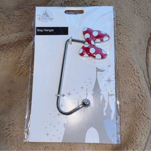 Disney Handbags - Disney Parks Bag Hanger Polka Dot Bow Minnie Mouse keep bag clean NEW